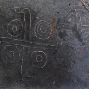 Carving of swastika and wheel of life outside the Dukhang, Likir Gompa