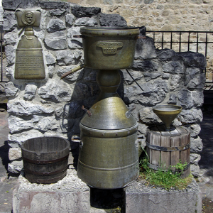 Monument to distillation of orujo, in Potes
