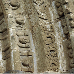 Ermita se San Pedro de Echano - detail of carving around door arch