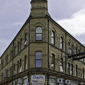 Clock tower on the Carlton Buildings in Crown Street, Hebden Bridge