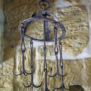 Grappling iron usedl to retrieve a lost bucket, Gharb Folklore Museum