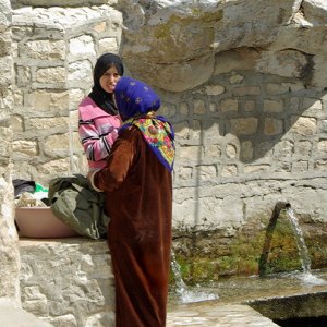 Kesra - washing day in the pool at the foot of the waterfall