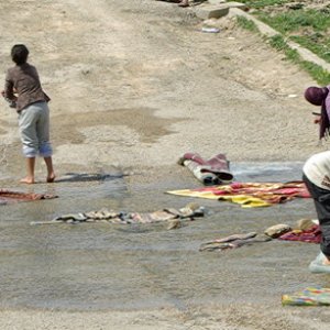 Kesra - washing day in the ford above the village
