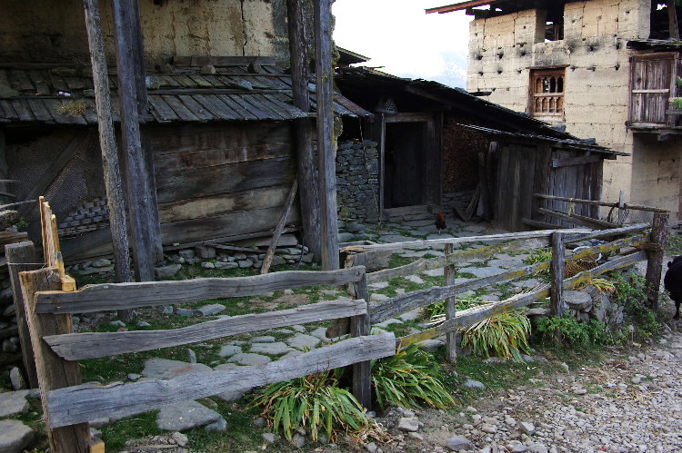 Bhutan - sheds attached to a rural farmhouse