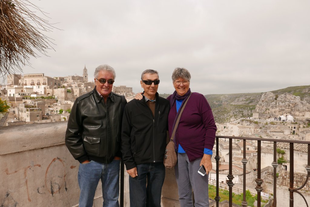 Rob Mari, Steve and Pauline Kenny with the Sassi of Matera in the background