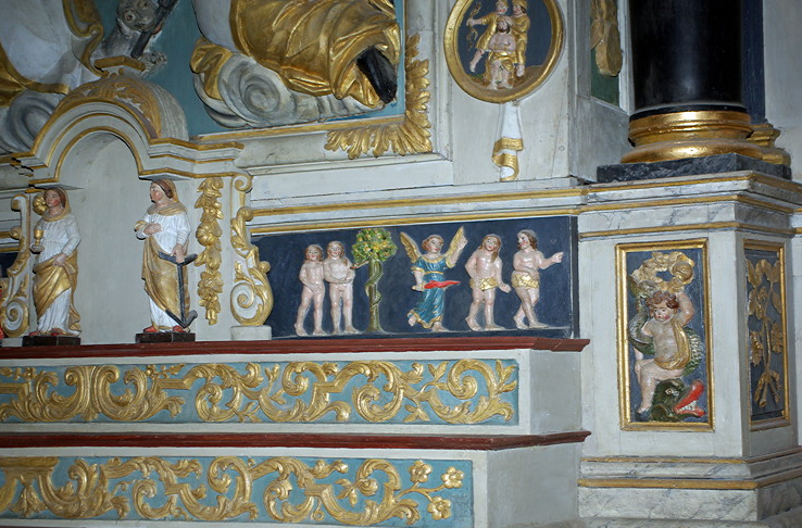 St Thégonnec church north aisle altar - temptation and banishment