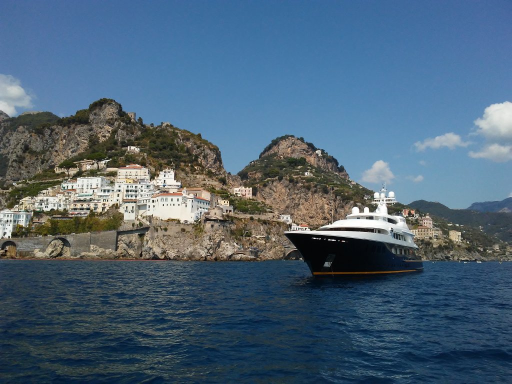 view of an Amalfi Coast town from the ferry from Salerno to Amalfi