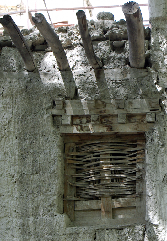 Windows wewre traditionally covered with plaited willow, Chilling Village.